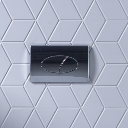 product lifestyle image for Roper Rhodes Ellipse Chrome Dual Flush Push Plate on white geometric cube pattern tile wall TR9004